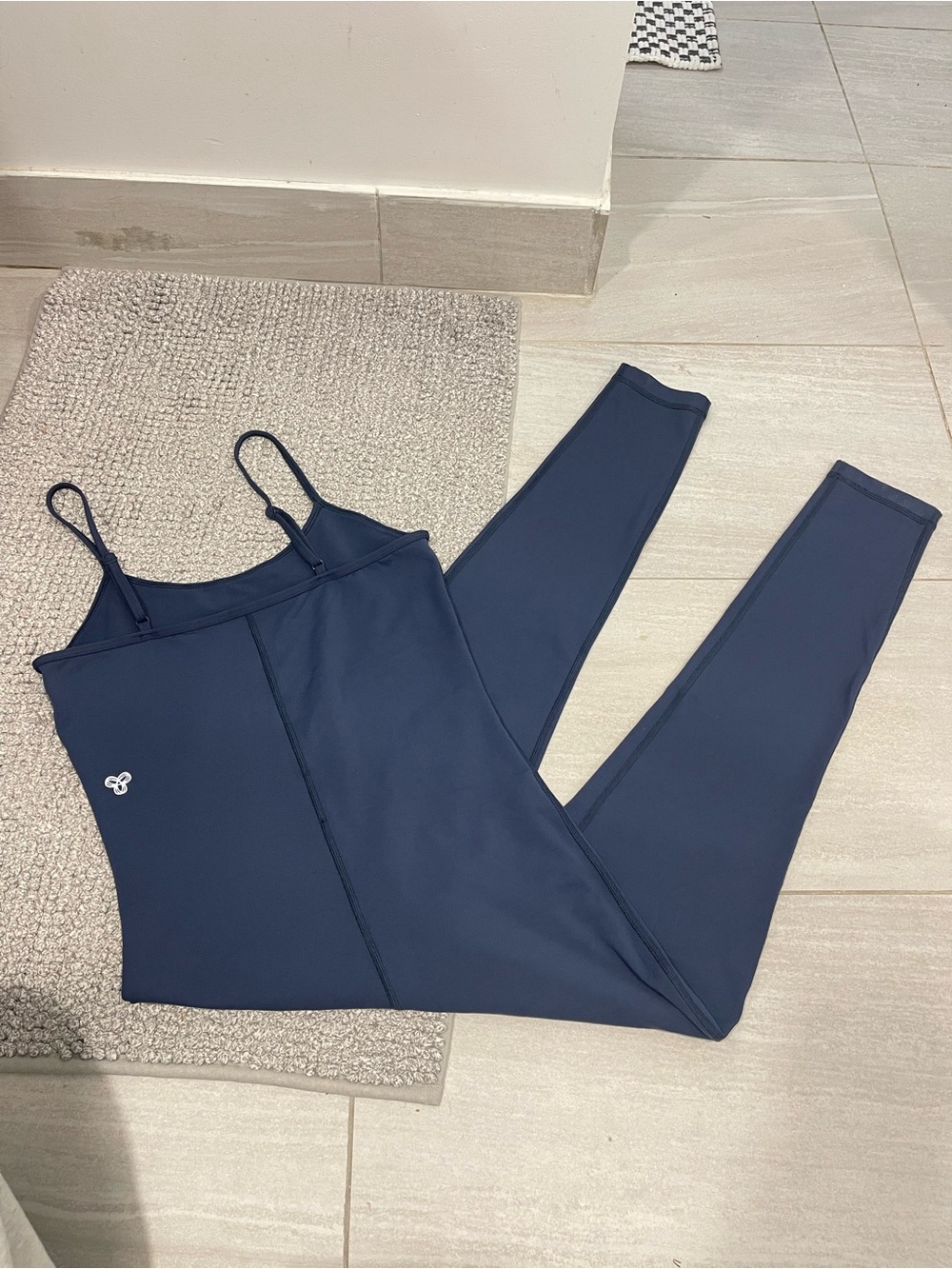 TNA action jumpsuit size medium blue one piece Athleisure